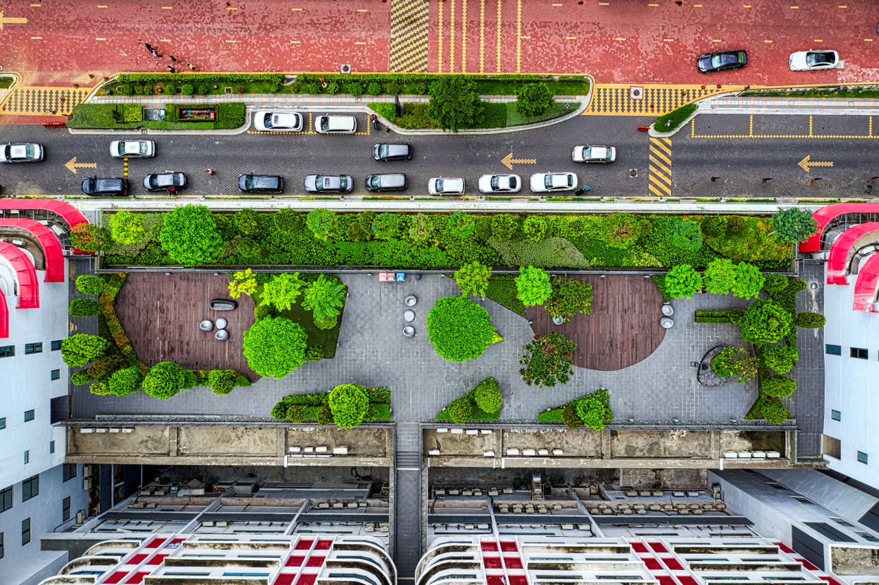 Aerial view of a lush green rooftop garden in Petaling Jaya, Malaysia. Urban architecture meets nature.